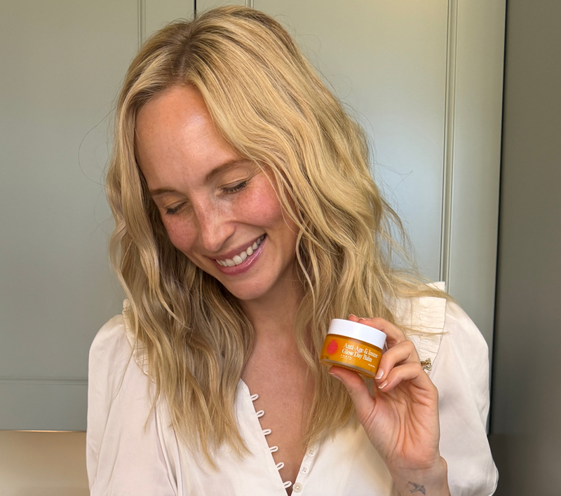 Dr Becky Campbell with Frøya Organics products