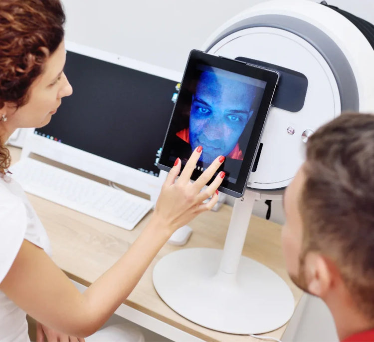Dermatologist reviewing a facial skin scan