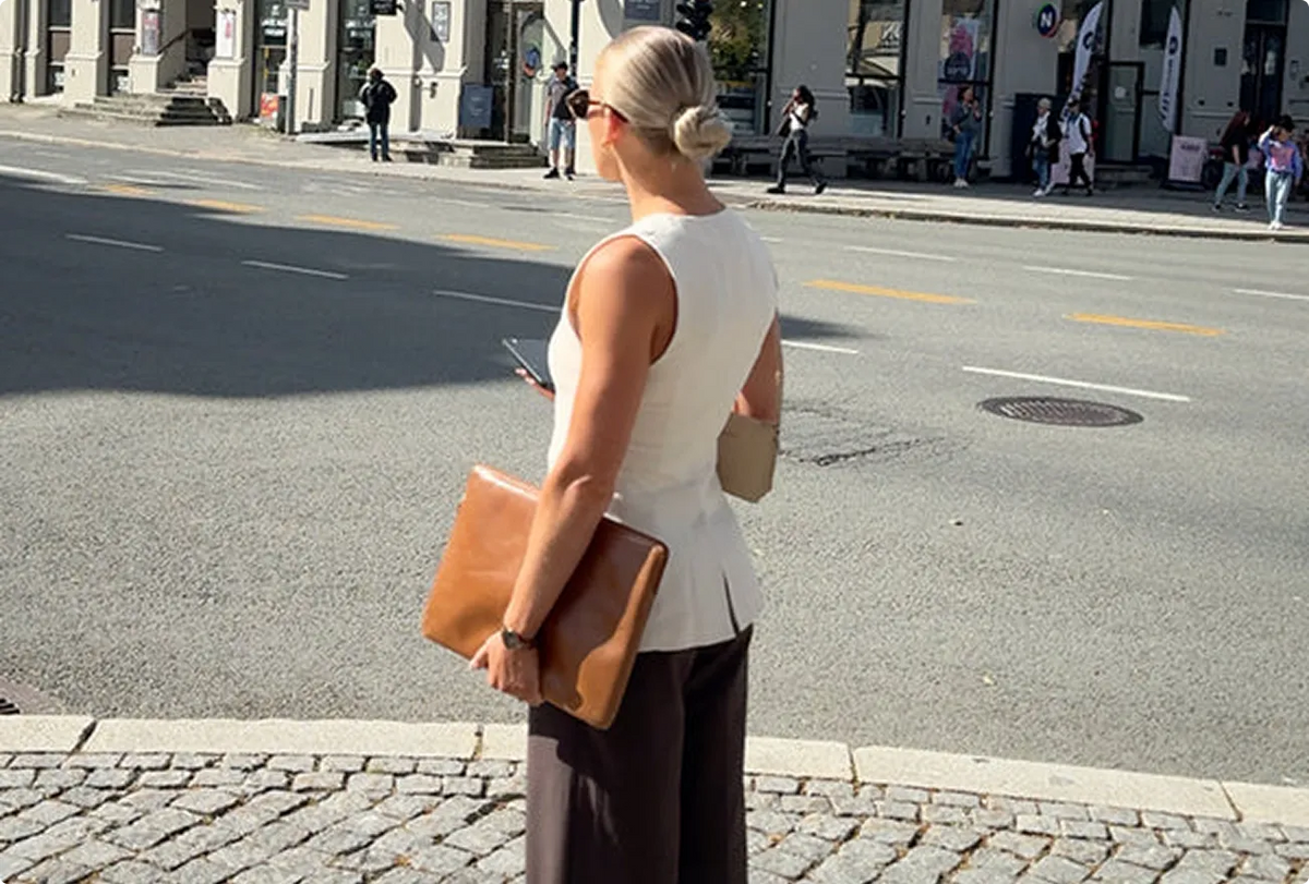 Line Pevik standing on a city street