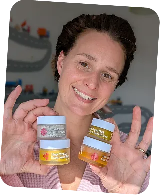 Woman applying Frøya Organics serum