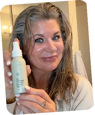 Woman holding Frøya Organics products